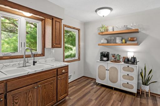 Tasteful and clean kitchen with newer windows