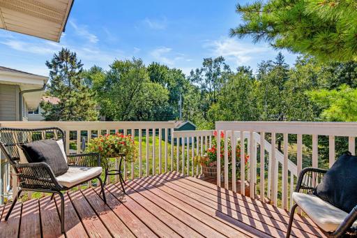 Great deck that overlooks your yard with mature trees