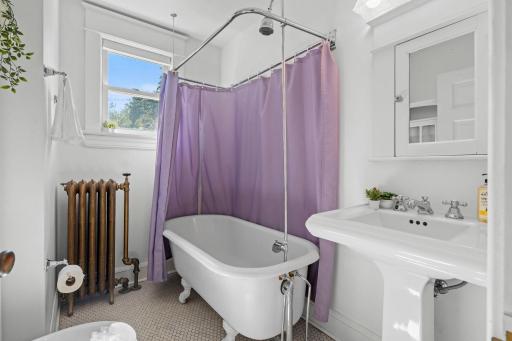 Full bathroom on the 2nd floor has a beautiful clawfoot tub with shower
