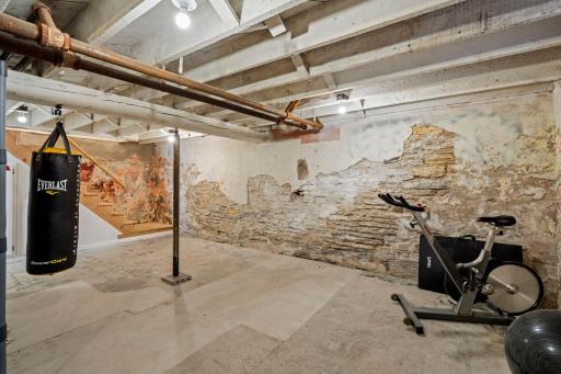 There is lots of space in this basement. The seller used this as a workout space.