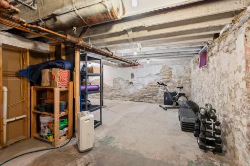 This basement is clean, dry and has lots of space for storage.
