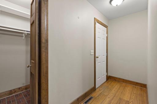 Mudroom with spacious walk in closet and access to the main garage stalls.