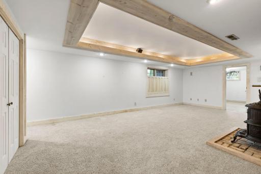 Coffered ceilings with stunning wood details, and recessed lighting on a dimmer.