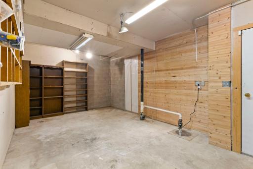 Workroom space accesible from both the lower level and garage.