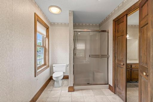 Walk in shower within the primary ensuite.
