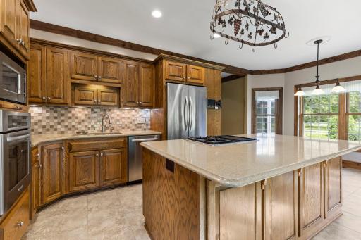 Stainless steel appliances featuring a reverse osmosis water filtration system serving the kitchen and refrigerator ice maker and water line.