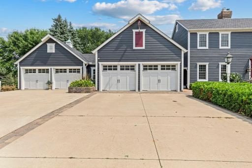 Extended concrete driveway with access to all garage stalls.