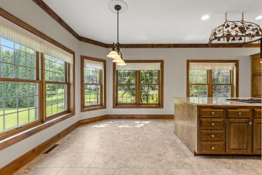 Beautiful bay alcove offering an informal dining space.