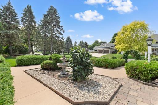 Complete with pavers extending to the road offering a unique enterance to the property.