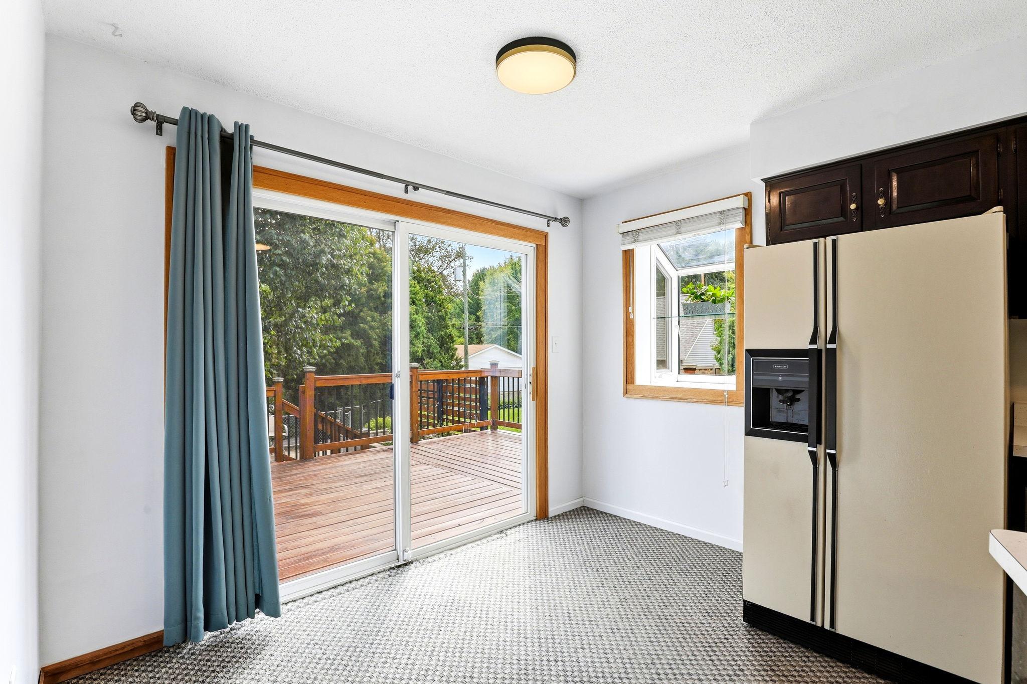 Dining space off the kitchen with direct access to a New large, inviting deck. (2024)
