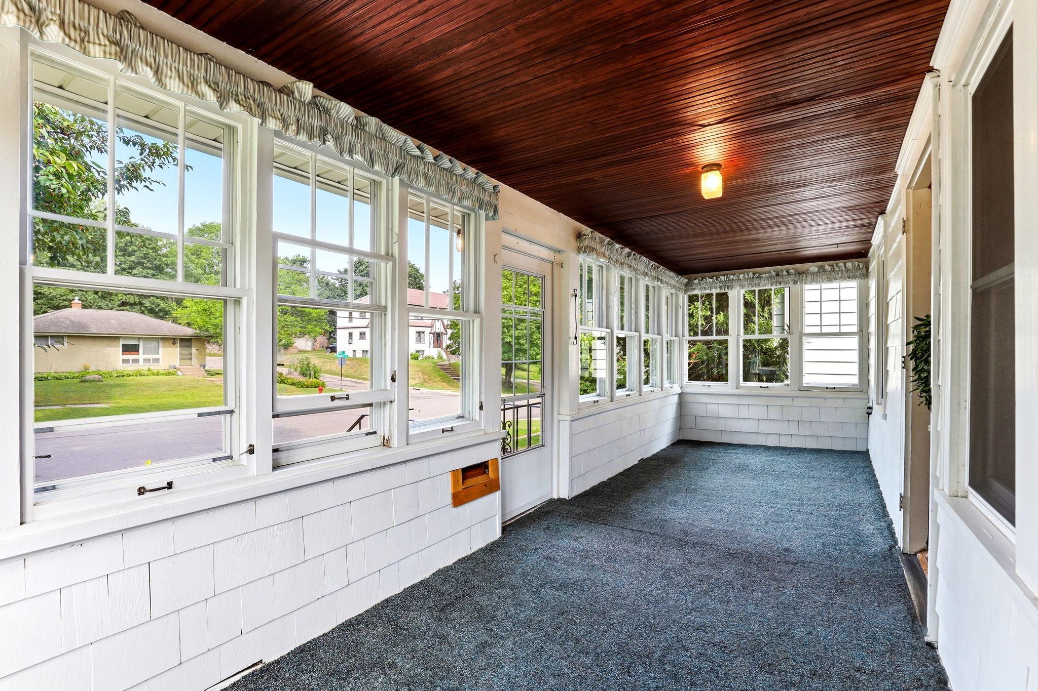 Charming screened front porch perfect for morning coffee and summer evenings.