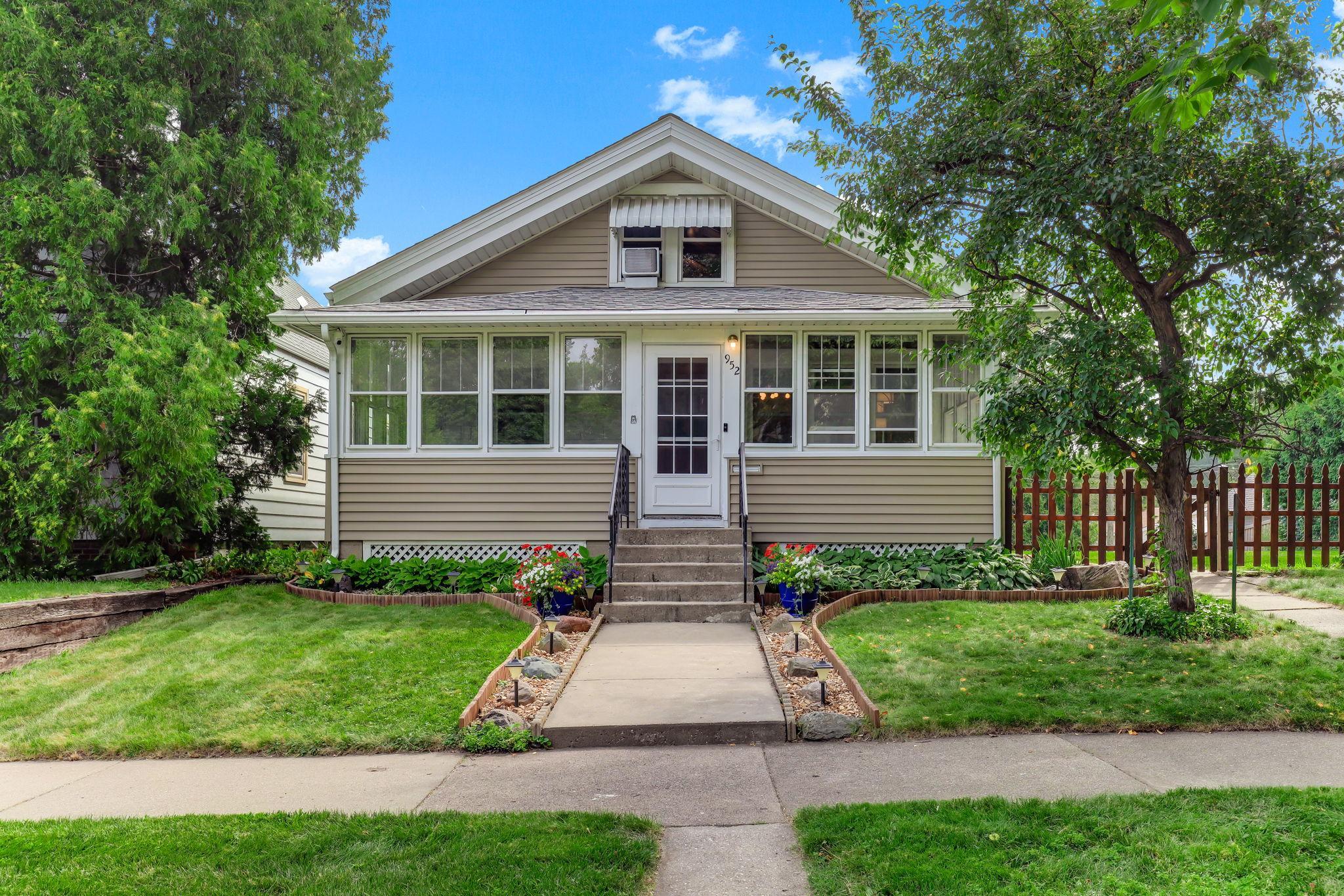 Charming 1½-story 1920s home showcasing classic period architecture and warm curb appeal.