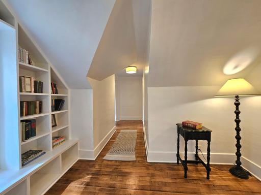 UL hall features built in book case and window seat!