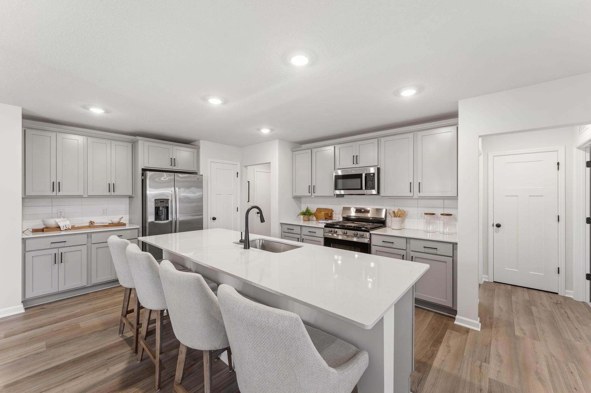 With nearly 2,500 above ground FSF, 5 spacious bedrooms, 3 stylish bathrooms & 3 car garage, this thoughtfully designed home has something for everyone! (Picture for representation only, colors and materials may vary in actual home.)