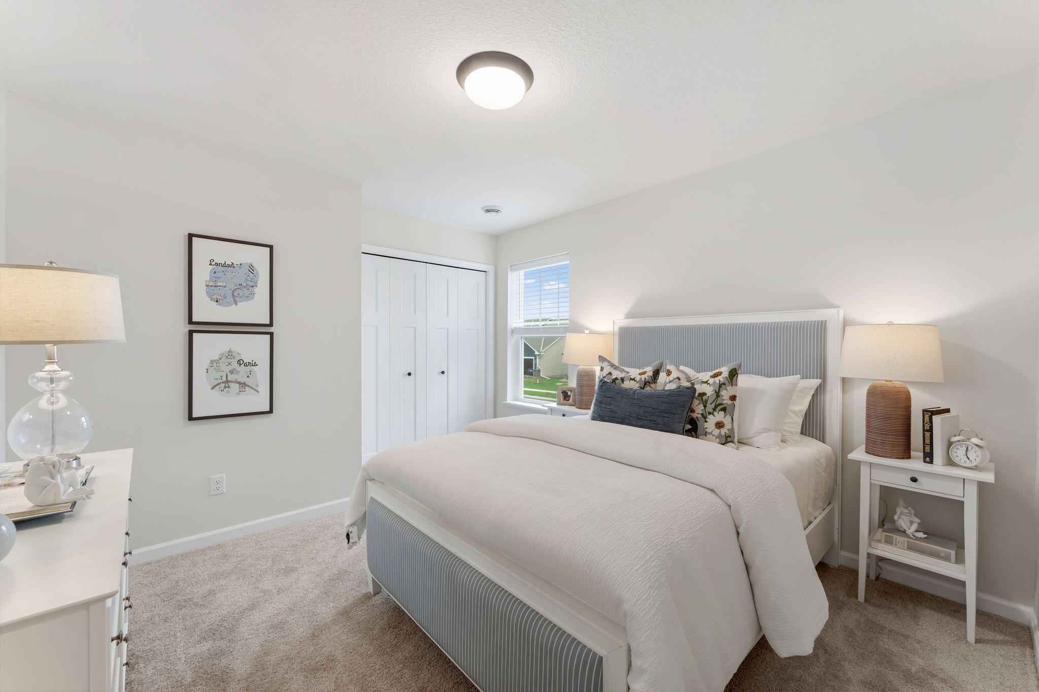 Upper level bedroom 4 of 4, each of which are conveniently located just steps from the full bathroom and feature ample closet space, an abundance of light. (Picture for representation only, colors & materials may vary in actual home.)
