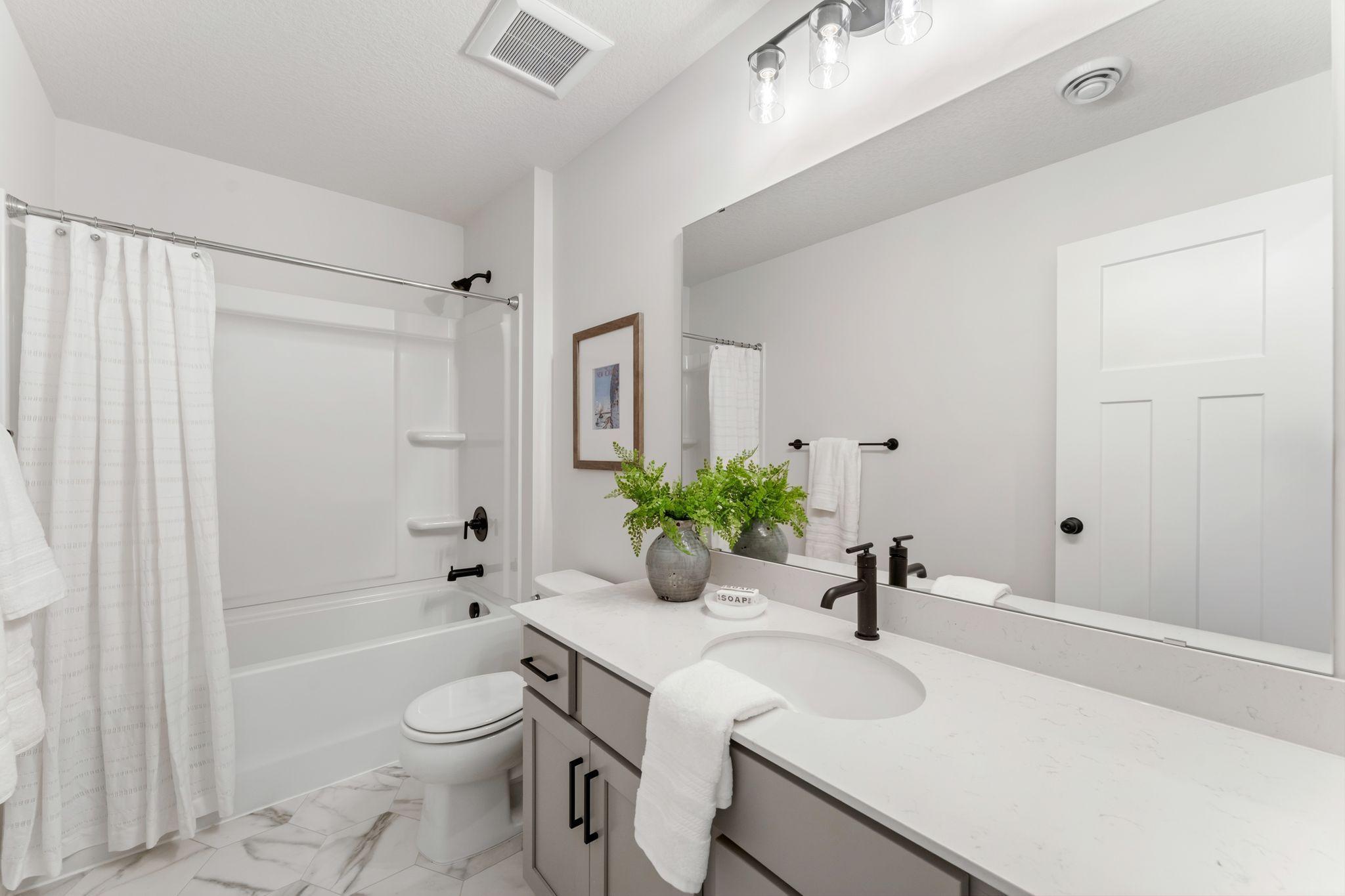 Thoughtfully designed & perfectly placed just steps from each of the secondary upper level bedrooms, this spacious upper level full bathroom offers many of todays desired amenities. (Picture for representation only, colors & materials may vary.)