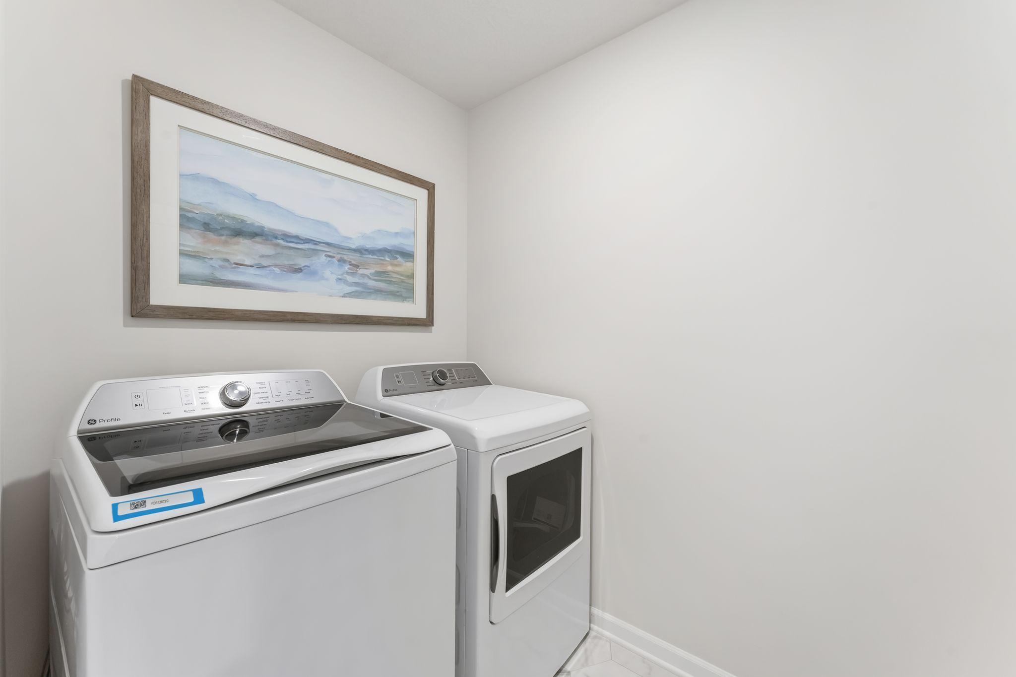 Wow! GE Washer & Dryer included! Yup, just move in and start doing laundry, no waiting! This spacious laundry room is conveniently located on the upper level of this home! (Picture for representation only, colors & materials may vary in actual home.)