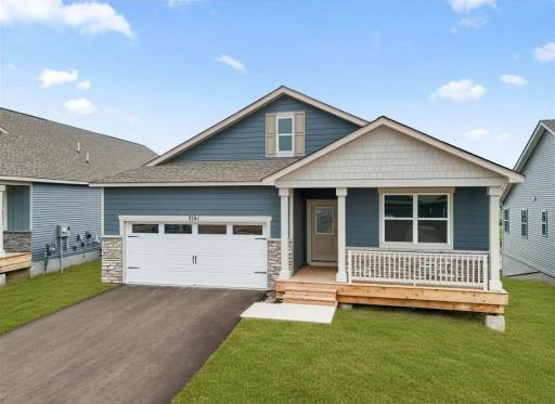 Welcome to the Cali at Bluff View in Shakopee! Top notch curb appeal with front porch entry and more. Welcome to one level living! Photo of actual home.