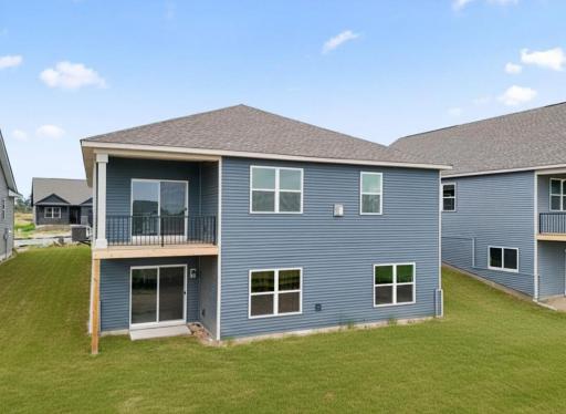 Enjoy the panoramic bluff views from your covered deck. Photos of actual home.