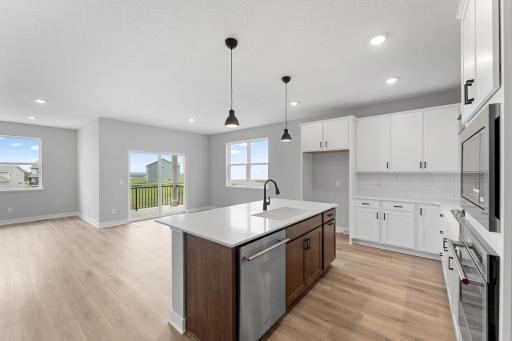 Open concept floor plan perfect for living and entertaining. Photo of actual home.