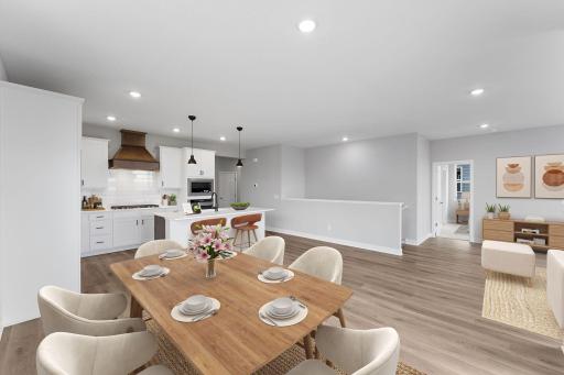 The Cali offers a spacious kitchen with island for seating. Photo of actual home.