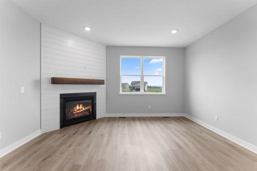 Cozy gas fireplace for the cold winter days. Photo of actual home.