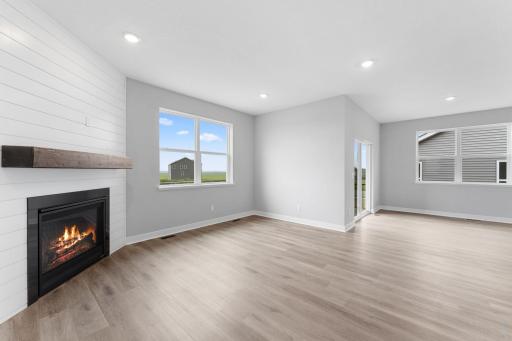 An abundance of windows provides a flood of natural light in the living spaces. Photo of actual home.