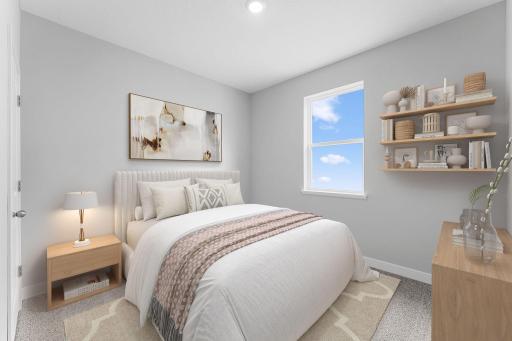 3rd of 4 main level bedrooms. Photo of actual home.