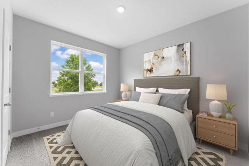 4th of 4 main level bedrooms. Photo of actual home.