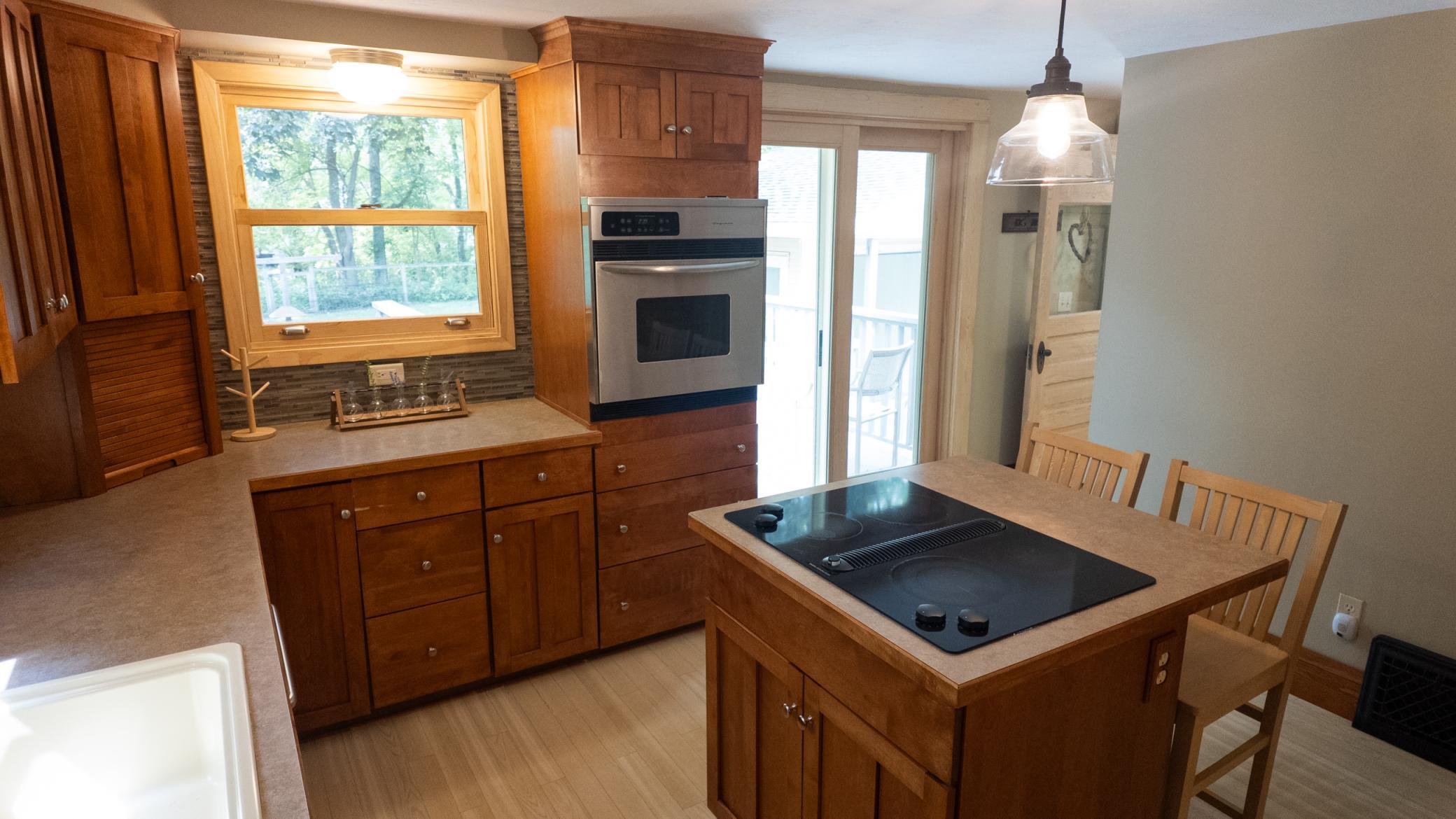 Kitchen with patio door to the backyard