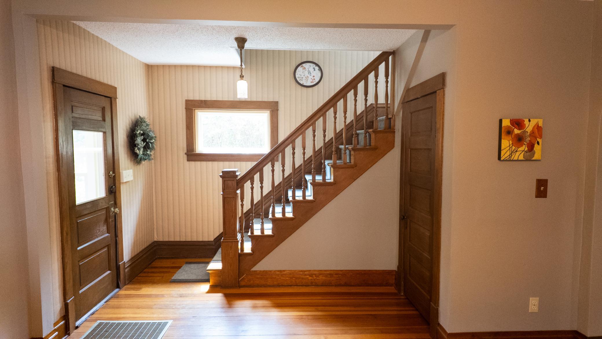 Staircase and Hardwood Floors