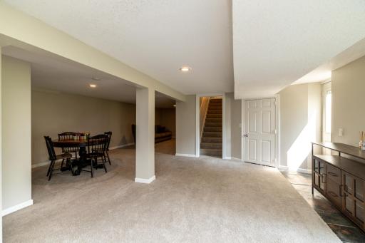 Lower Level Features Two Separate Family Room Areas