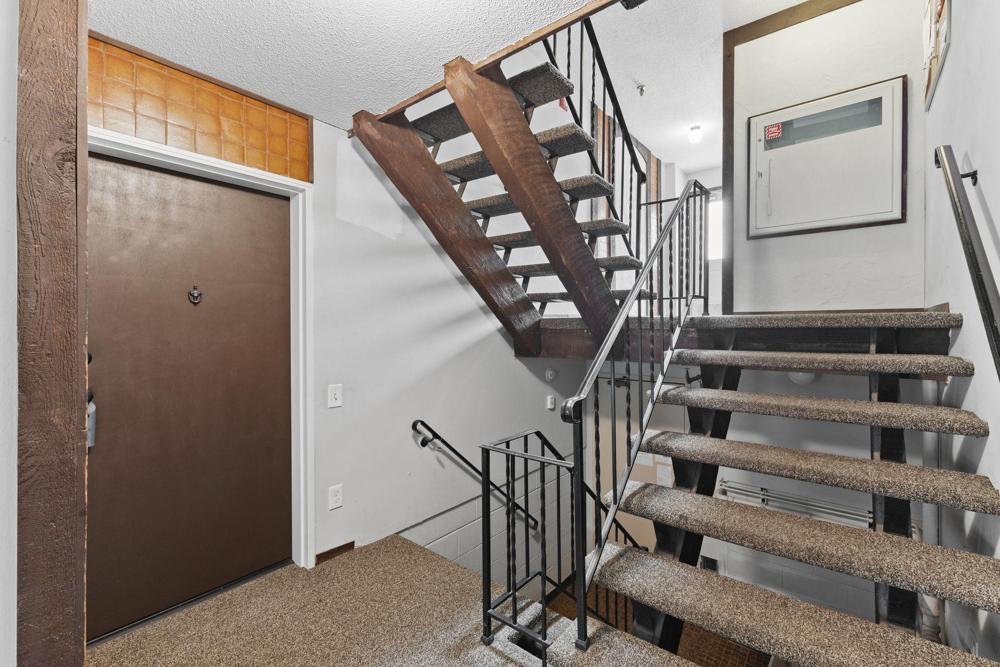 Down 7 steps to unit 102