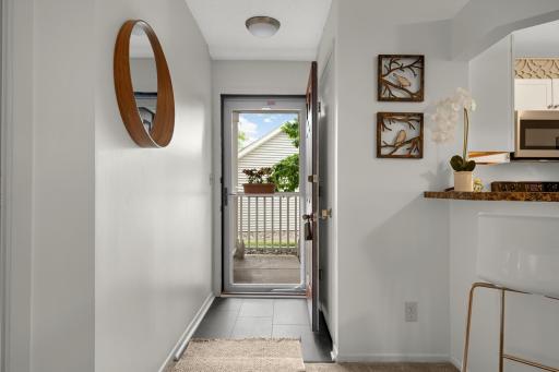 Bright, clean entryway opens directly into the home, with easy access to the kitchen and main living areas.