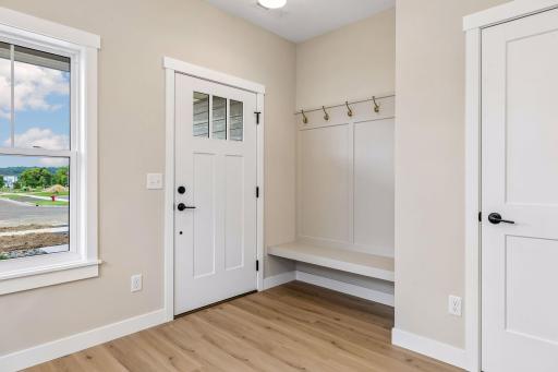 Front entrance with seating and coat storage