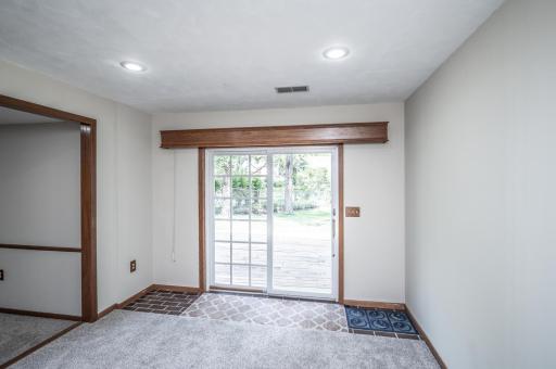 The walkout lower level leads to the large flat backyard