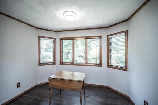 The informal dining area provides plenty of light and overlooks the backyard