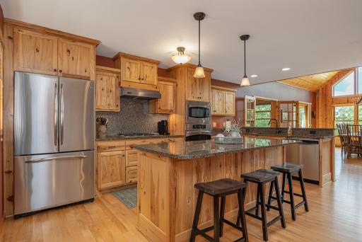 Open concept kitchen with stainless steel appliances