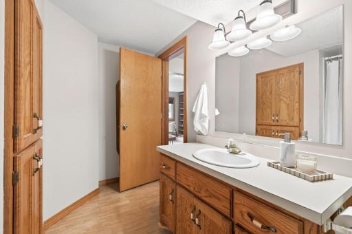 The 3/4 bathroom is located just off the lower level kitchen.