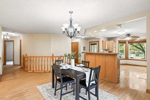 The dining room is open to the kitchen and living rooms, making it an ideal spot to sit for everyday living and hosting.