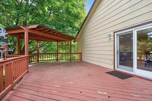 Deck located off of the dining room with steps leading to the backyard.