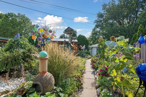 The garden is adorned with beautiful artwork throughout