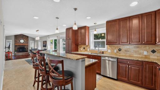 Updated kitchen with granite countertops and stainless appliances.