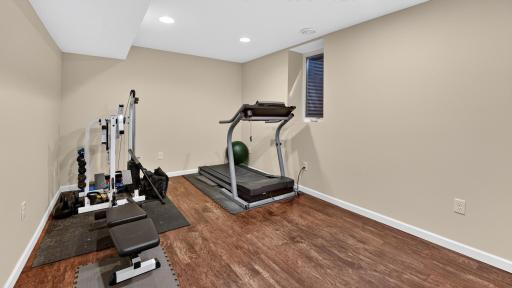 Lower level bedroom, currently used as an exercise room.