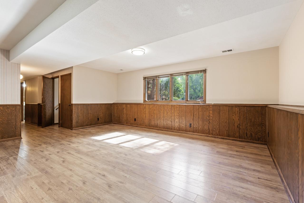 Family room with lookout windows that fill the space with natural light.