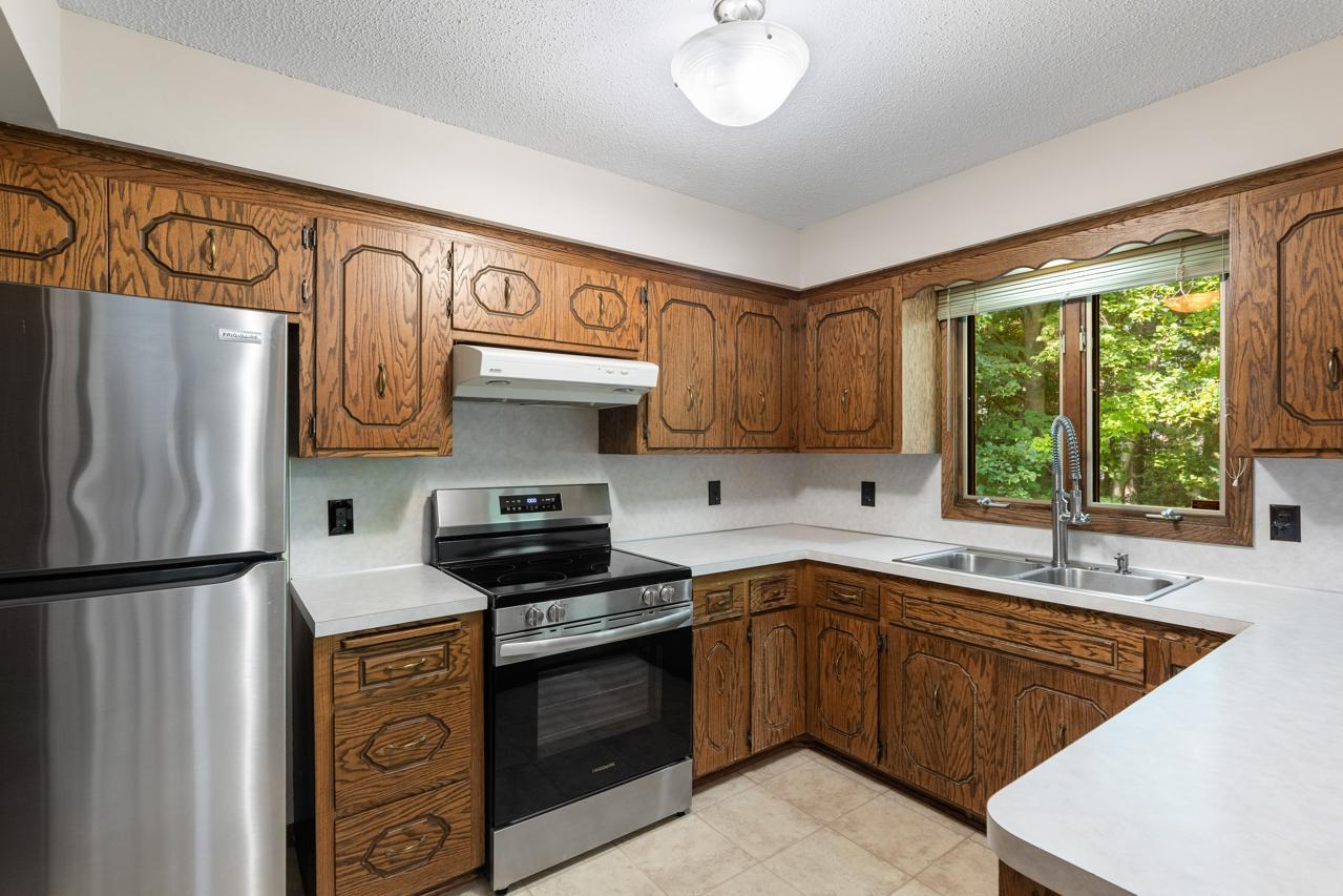 The bright, functional kitchen is equipped with stainless steel Energy Star appliances for everyday convenience and energy savings.