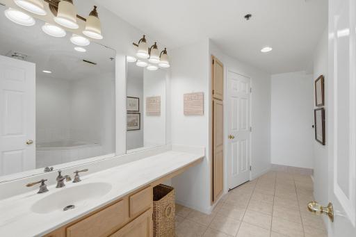 Primary bath with a separate shower and jazuzzi jetted tub.
