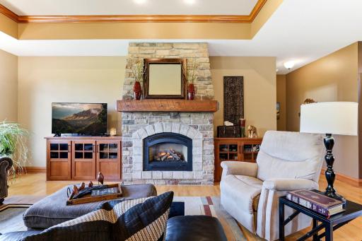 Beautiful stone gas fireplace and built in cabinets