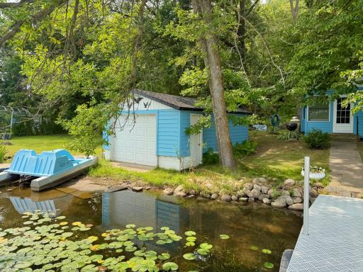 Boat house and paddle boat included!