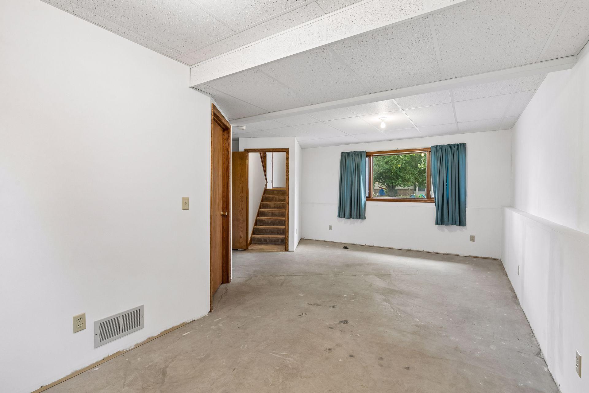 A view of the family room area looking towards the front of the home.